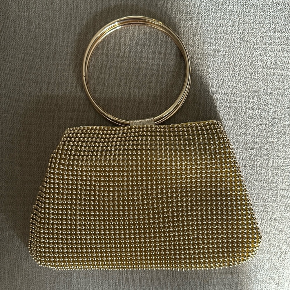 New gold hand bag